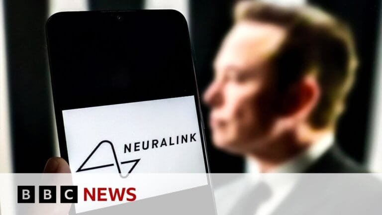 Smartphone displaying Neuralink logo with blurry background.