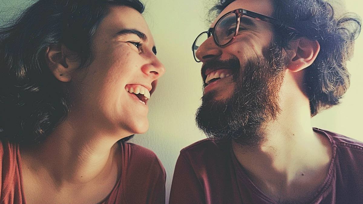 Joyful couple laughing close-up.